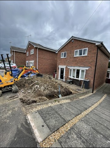 Driveway, sleeper walls and oak porch