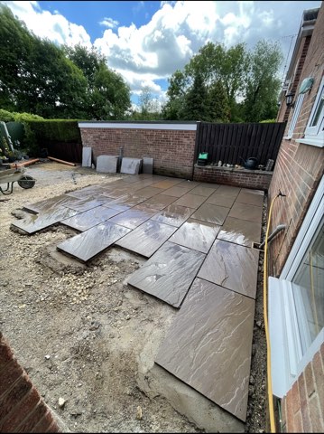 Driveway, sleeper walls and oak porch