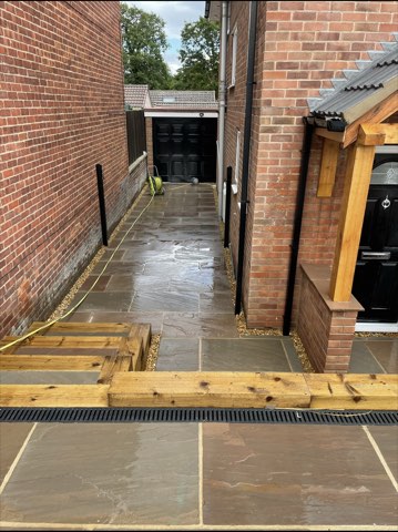 Driveway, sleeper walls and oak porch