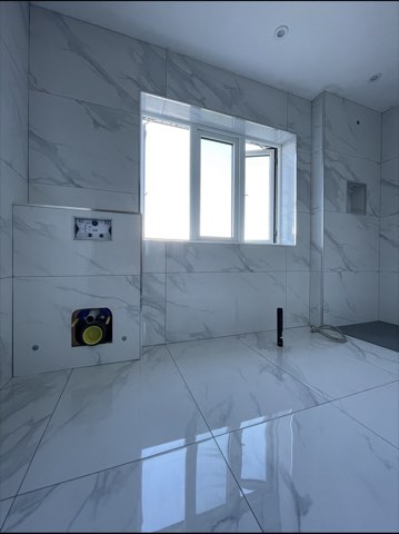 Bathroom, back to the joists